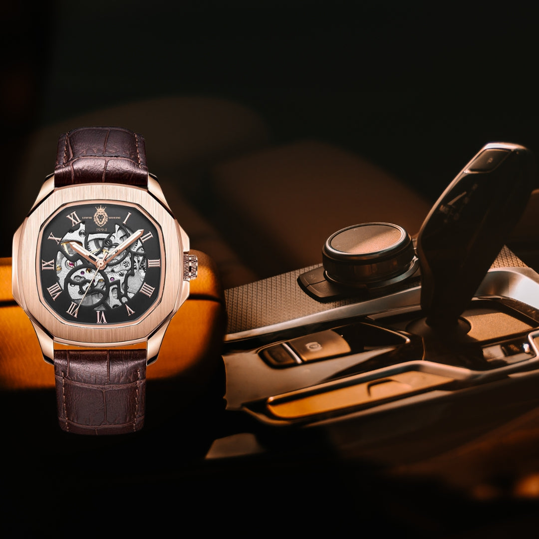 Luxury automatic watch with leather strap and intricate dial design on car interior background.